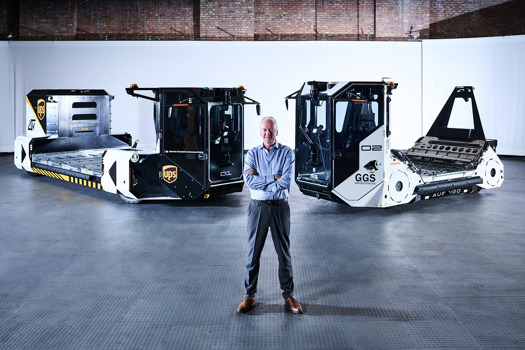 David Keene, CEO of Aurrigo International plc, with Auto-Cargo® and Auto-DollyTug®