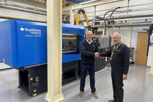 Supporting lifelong industry learning, Sumitomo (SHI) Demag Managing Director Dave Raine (L) hands over an IntElect X-tra to PTIC centre manager Andrew Baker (R)